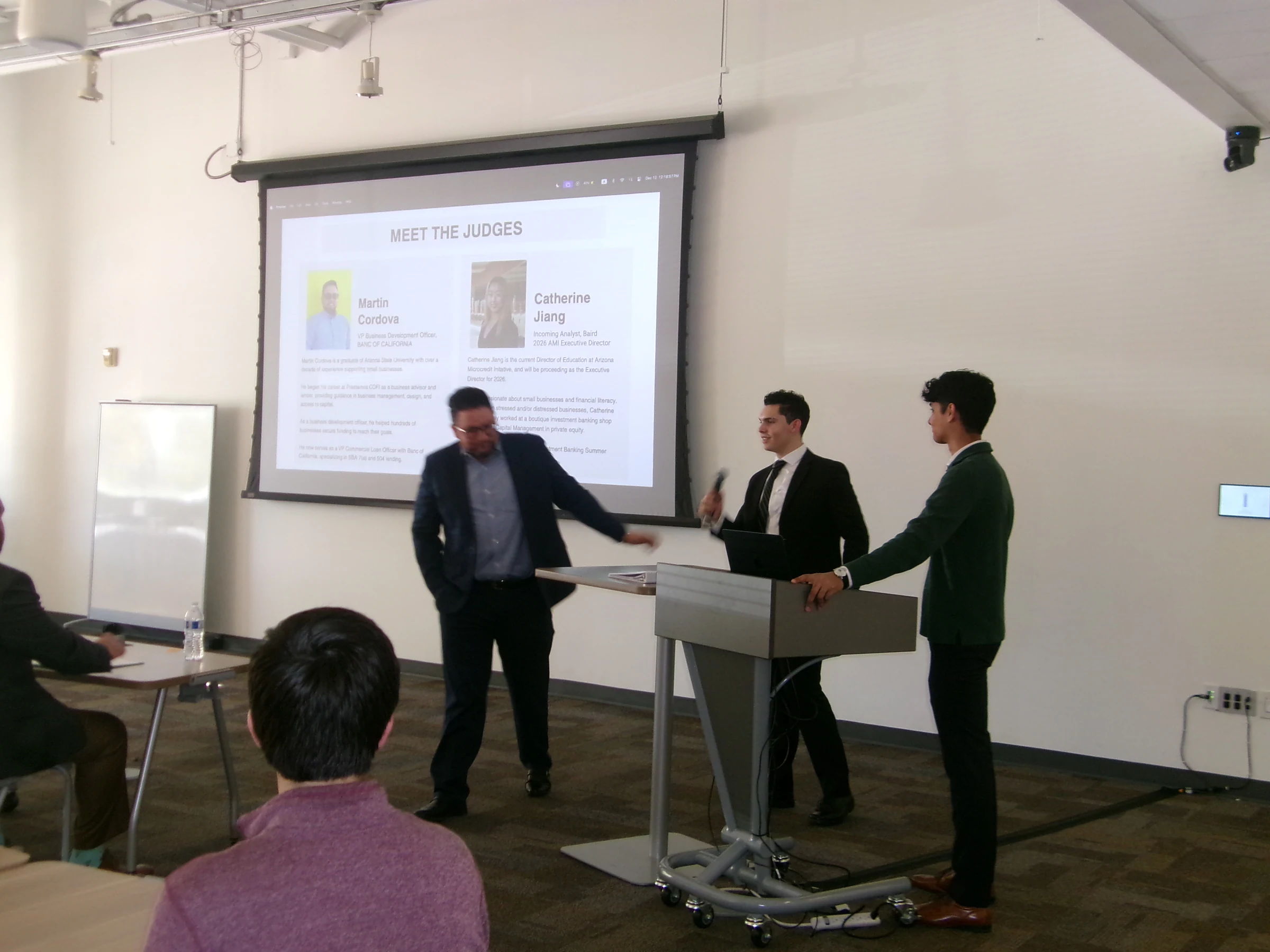 Speakers and community members gathered at AMI’s December 2025 pitch competition